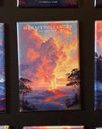 a collection of colorful magnets depicting various scenes, including a landscape with a volcano and a sunset.