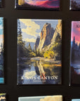 a collection of magnets depicting various landscapes, including mountains, forests, and bodies of water. The magnets are arranged in a grid-like pattern, showcasing the diverse scenery of the world.