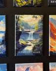 a collection of landscape magnets, each depicting a different natural scene. The magnets are arranged in a grid-like pattern, showcasing various pictures of national parks, including Cuyahoga Valley National Park and Grand Canyon National Park.