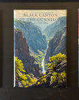The image is a framed print of a scenic mountain landscape, specifically depicting the Black Canyon of the Gunnison National Park.