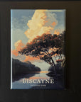 The image is a framed magnet depicting a scenic landscape with a tree and a body of water, likely representing Biscayne National Park.