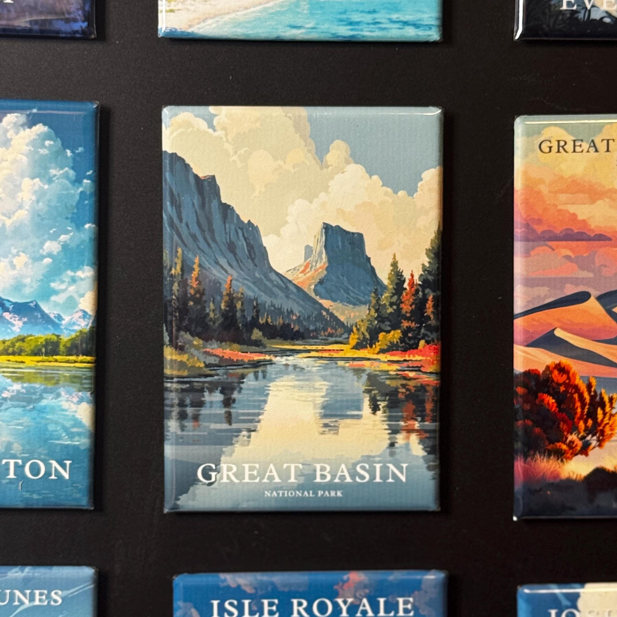 a collage of various landscape scenes, including mountains, forests, and bodies of water, with the central image being a magnet for the Great Basin National Park.