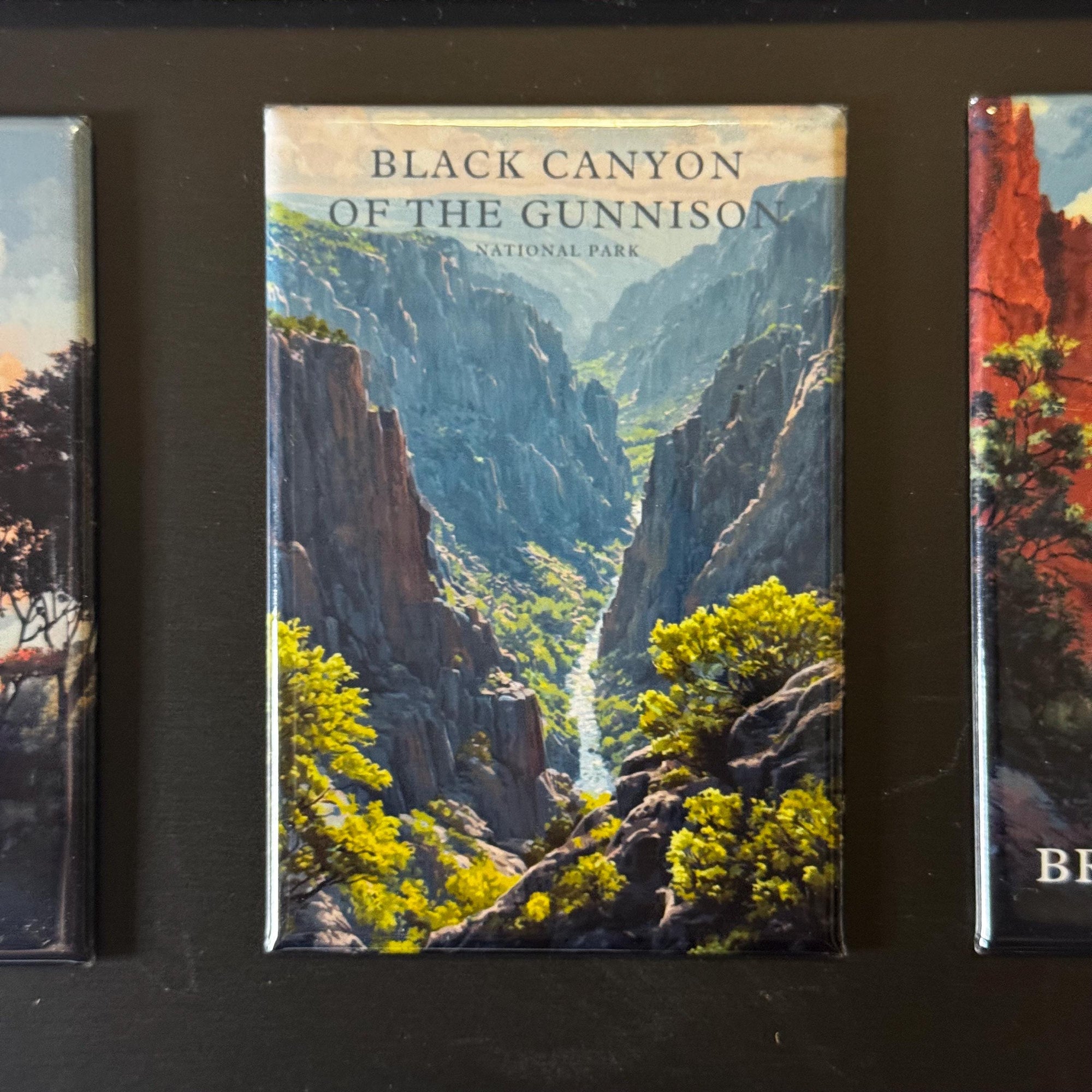 The image is a framed print of a scenic mountain landscape, specifically depicting the Black Canyon of the Gunnison National Park.