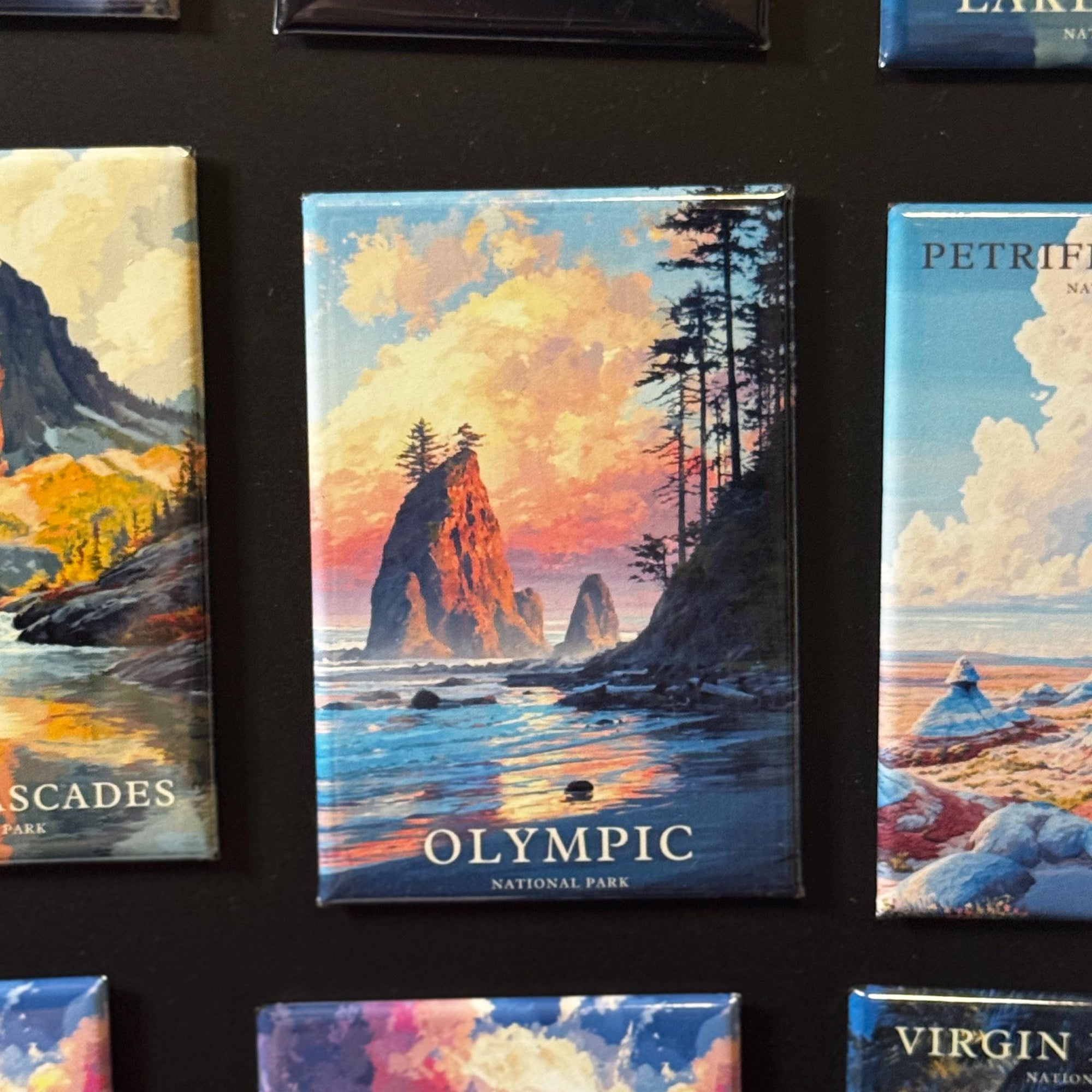 a collection of magnets depicting various landscapes, including mountains, forests, and bodies of water.